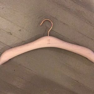 Kit and Ace wooden hangers with copper neck.